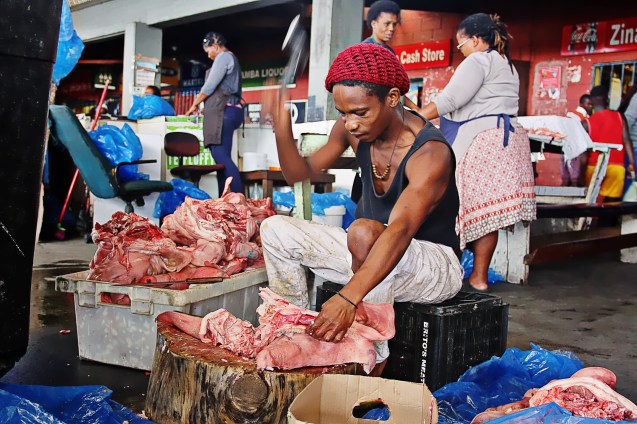 Cutting up meat with an axe