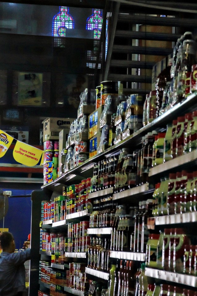 Stained glass windows in the supermarket, once a church