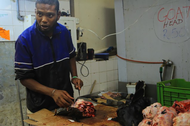 Skinning a goat head