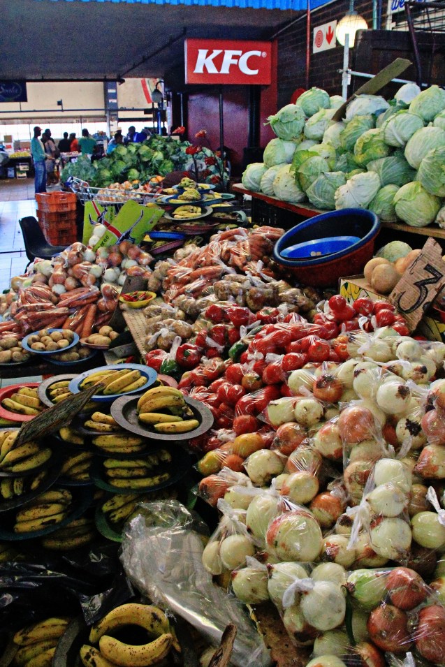Love the contrast. Fruit and veggies....and KFC.