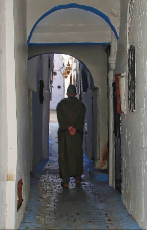 Man in Djellaba in an alley